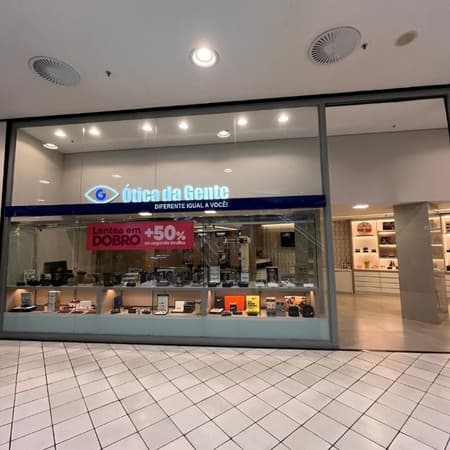 Logo da loja otica da gente