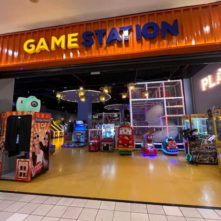 Logo da loja game station